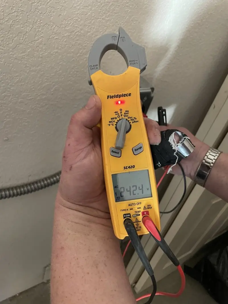 Voltage testing with clamp meter during Ceiling Fan Installation in Honesdale